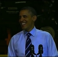 Obama smiles at Chrysler plant